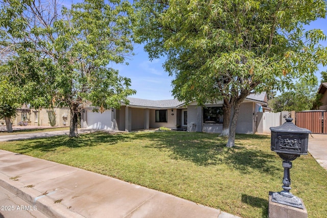 1540 E Glencove St, Mesa, AZ 85203 - view of front of property featuring an attached garage, concrete driveway, brick siding, and a gate