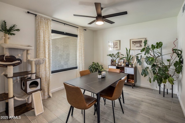 1540 E Glencove St, Mesa, AZ 85203 - dining space featuring a ceiling fan, wood finished floors, and baseboards