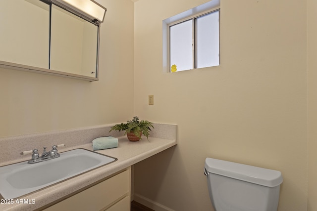6217 E Dodge St, Mesa, AZ 85205 - bathroom featuring toilet and vanity