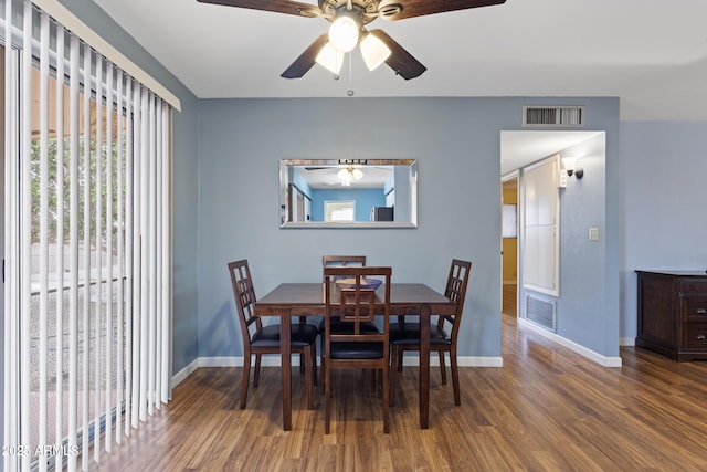 6217 E Dodge St, Mesa, AZ 85205 - dining space with healthy amount of natural light, wood finished floors, and baseboards