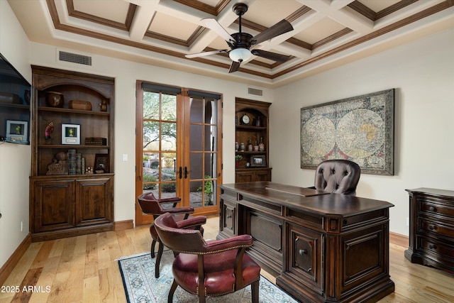 office area with coffered ceiling, crown molding, light hardwood / wood-style flooring, and ceiling fan