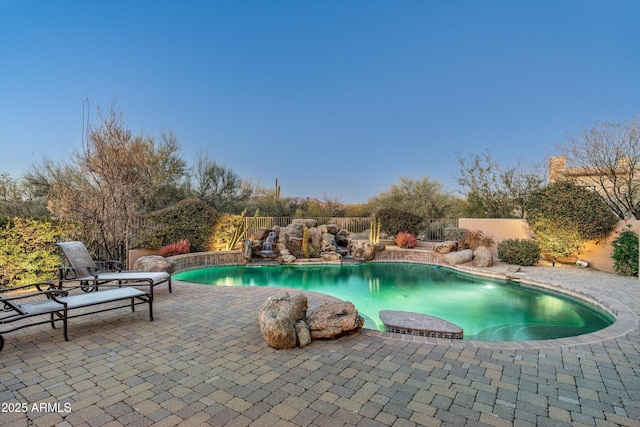 view of swimming pool featuring a patio