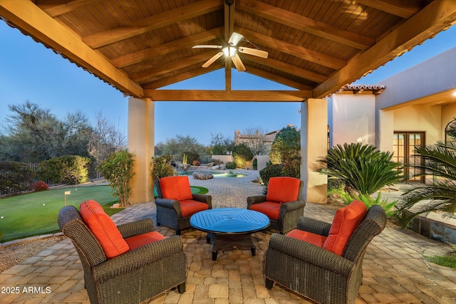 view of patio / terrace featuring an outdoor living space, a gazebo, and ceiling fan