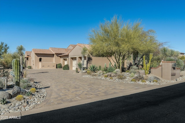 view of front of property featuring a garage