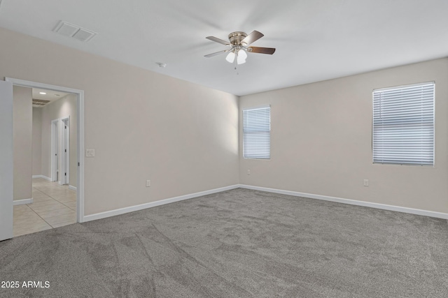 29402 W Mitchell Ave, Buckeye, AZ 85396 - empty room with carpet flooring, ceiling fan, and baseboards