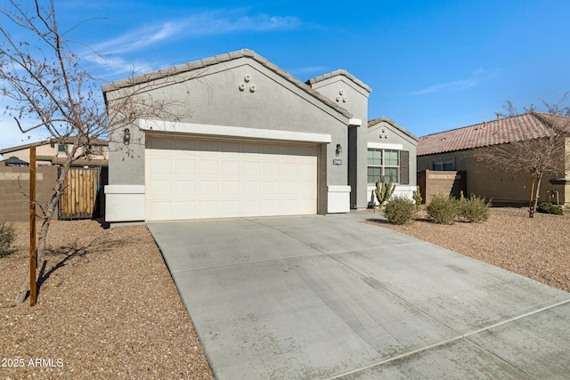 29402 W Mitchell Ave, Buckeye, AZ 85396 - view of front of property featuring a garage, stucco siding, driveway, and a tile roof