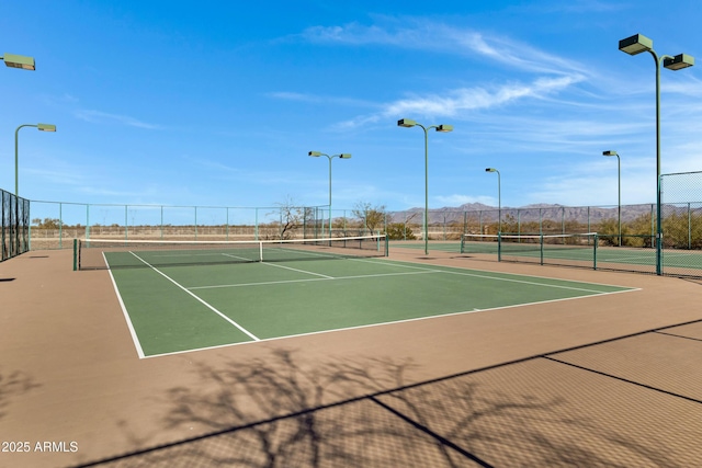 29402 W Mitchell Ave, Buckeye, AZ 85396 - view of tennis court with community basketball court and a mountain view