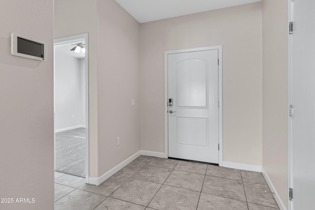 29402 W Mitchell Ave, Buckeye, AZ 85396 - entryway featuring baseboards and light tile patterned floors