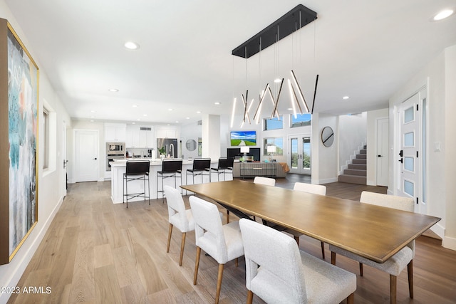 dining room featuring light hardwood / wood-style flooring