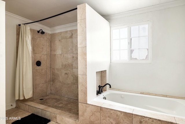 bathroom featuring crown molding, a garden tub, and tiled shower