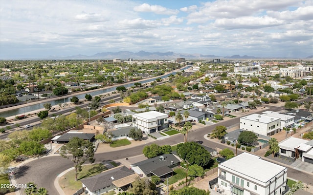 birds eye view of property featuring a mountain view