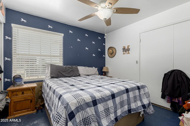 bedroom featuring a closet and a ceiling fan