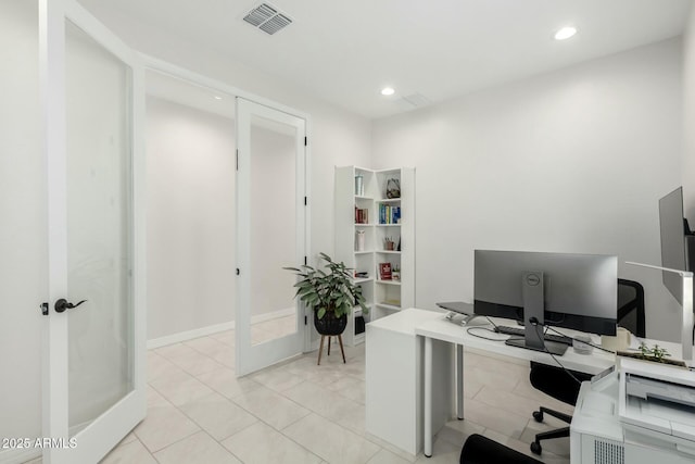 office with light tile patterned floors, visible vents, and recessed lighting