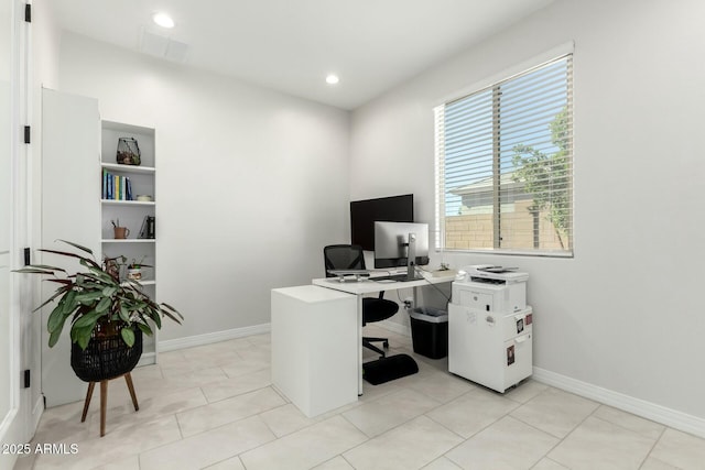 office featuring light tile patterned floors, baseboards, visible vents, and recessed lighting