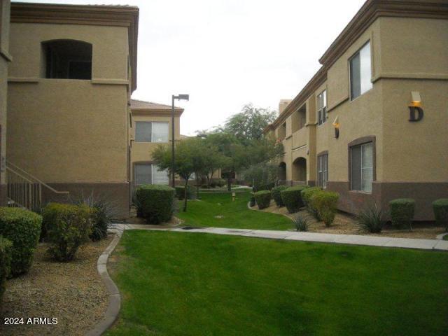 view of community with a lawn