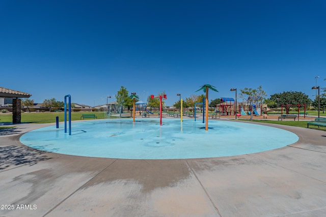 view of play area featuring a lawn