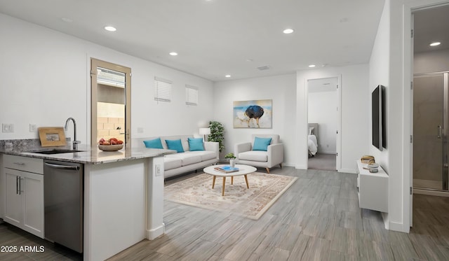 living room featuring sink