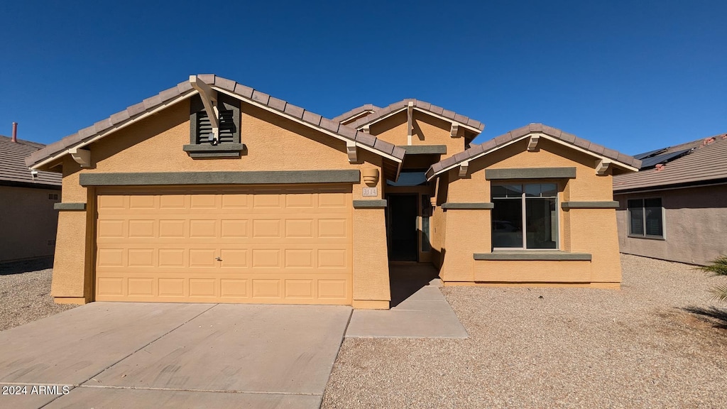 view of front of home featuring a garage