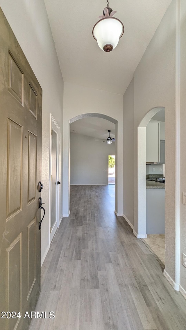 hallway featuring light wood-type flooring