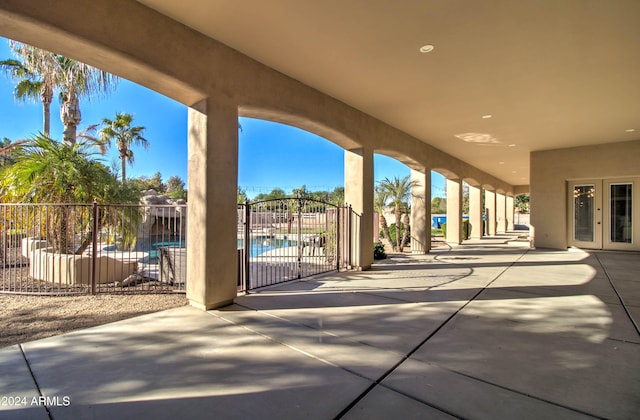 view of patio featuring a fenced in pool