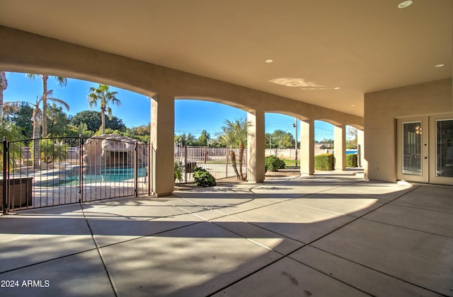 view of patio / terrace with a fenced in pool