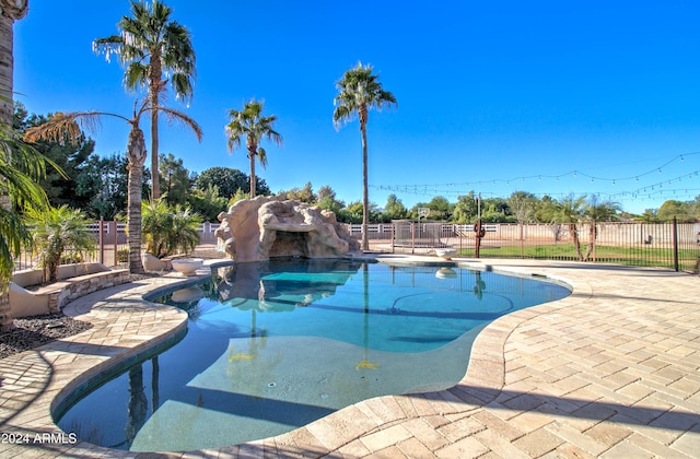 view of swimming pool featuring a patio