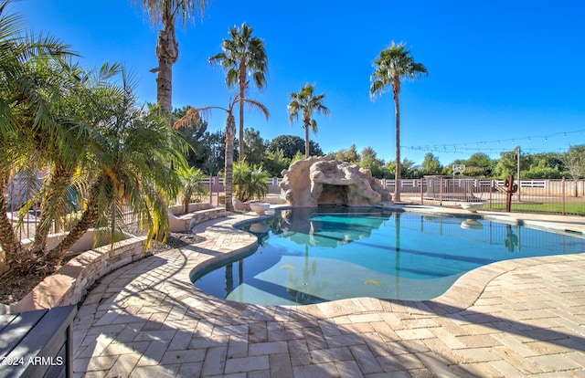 view of pool featuring a patio area