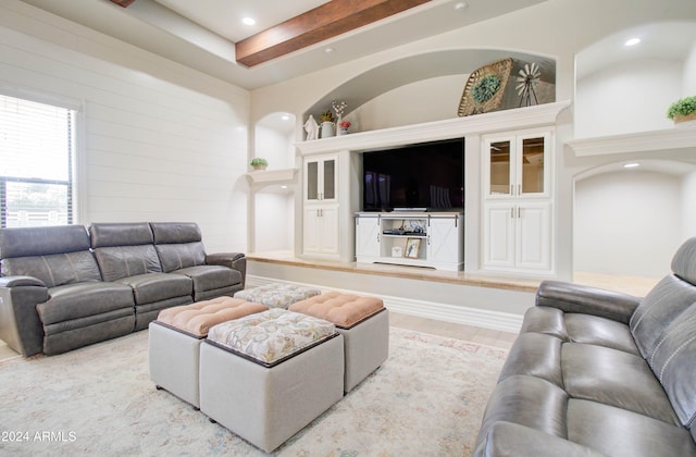 living room featuring wood walls and light hardwood / wood-style floors