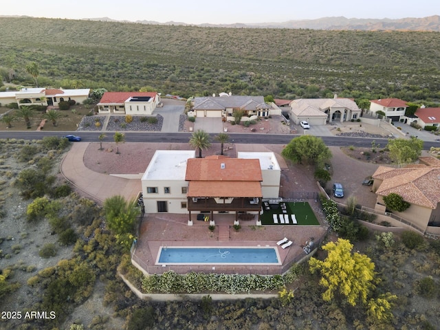 drone / aerial view featuring a mountain view