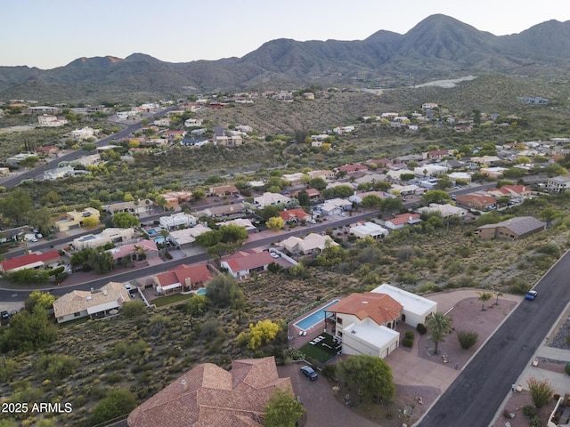 bird's eye view featuring a residential view and a mountain view