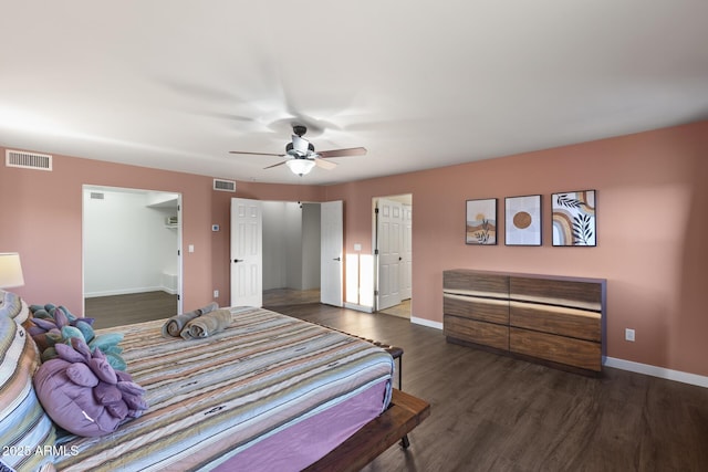 bedroom with baseboards, visible vents, ceiling fan, and wood finished floors