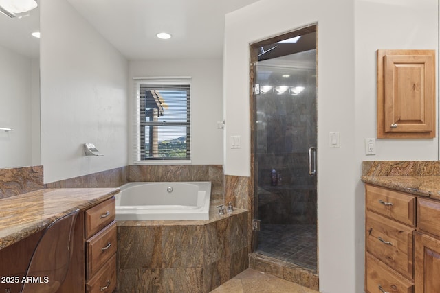 bathroom featuring recessed lighting, a garden tub, vanity, and a shower stall