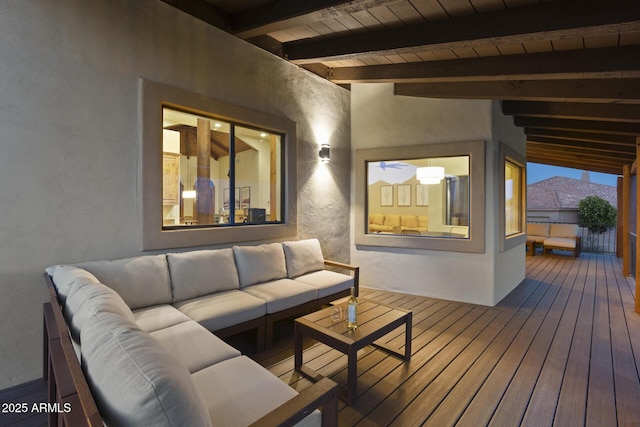 wooden deck featuring an outdoor living space