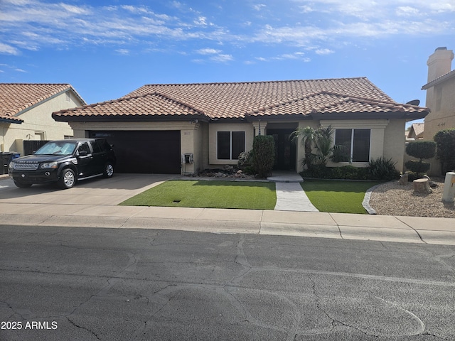 view of front of property with stucco siding, a front yard, a garage, driveway, and a tiled roof