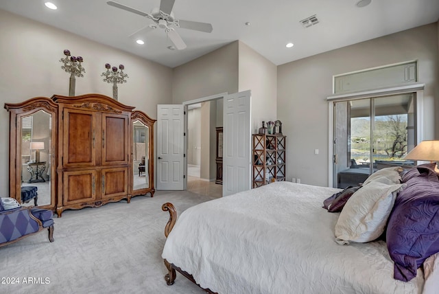 bedroom featuring access to exterior, light colored carpet, and ceiling fan