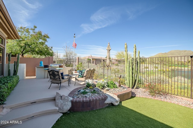 view of patio featuring a jacuzzi