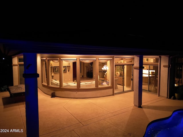 view of patio at twilight