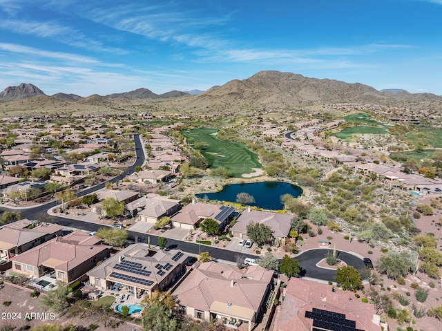 aerial view featuring a water and mountain view