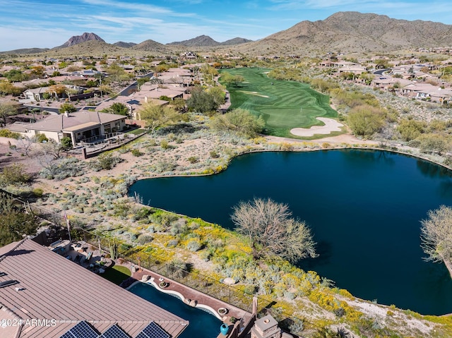 aerial view featuring a water and mountain view