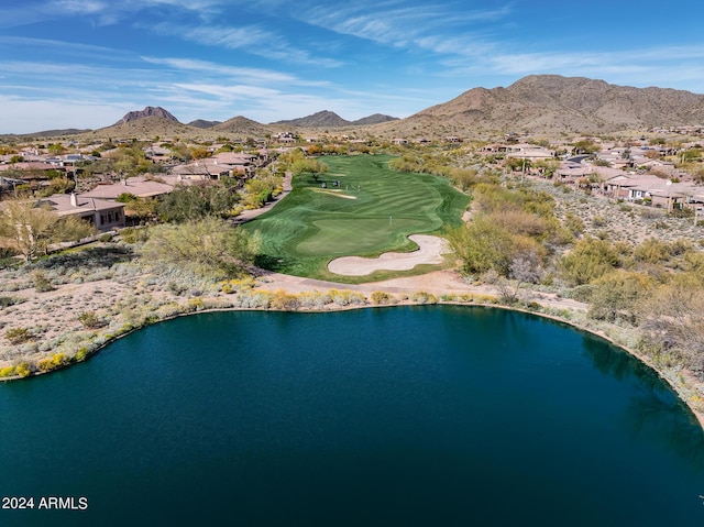 bird's eye view with a water and mountain view