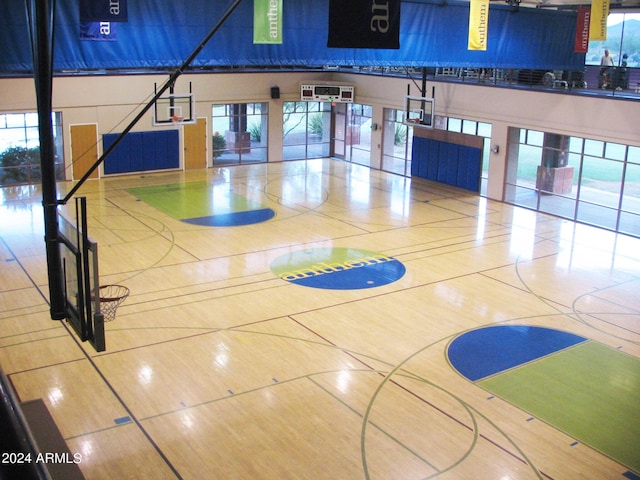 view of basketball court featuring a healthy amount of sunlight