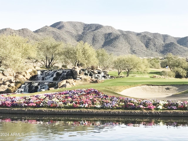 view of mountain feature with a water view