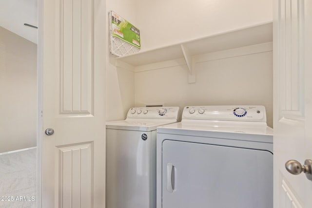 2725 E Mine Creek Rd Unit 1149, Phoenix, AZ 85024 - laundry area with separate washer and dryer and carpet floors