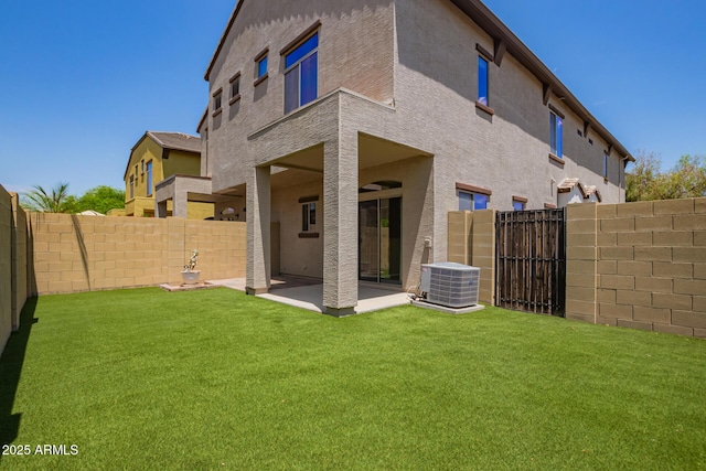 2725 E Mine Creek Rd Unit 1149, Phoenix, AZ 85024 - rear view of property with a fenced backyard, a patio, and stucco siding