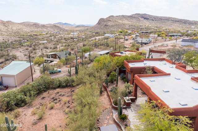 aerial view featuring a mountain view and a residential view