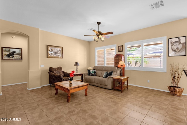 2069 E Winchester Way, Chandler, AZ 85286 - living room with ceiling fan and light tile patterned floors