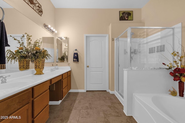 2069 E Winchester Way, Chandler, AZ 85286 - bathroom featuring double vanity, a shower stall, and a garden tub