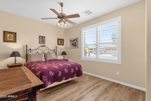 2069 E Winchester Way, Chandler, AZ 85286 - bedroom featuring light wood-type flooring and ceiling fan