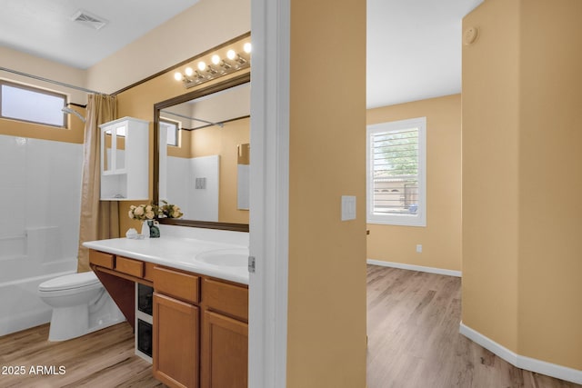 2069 E Winchester Way, Chandler, AZ 85286 - bathroom featuring vanity, shower / bath combination with curtain, and wood finished floors