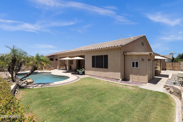 2069 E Winchester Way, Chandler, AZ 85286 - back of property featuring a tiled roof, a patio, and stucco siding